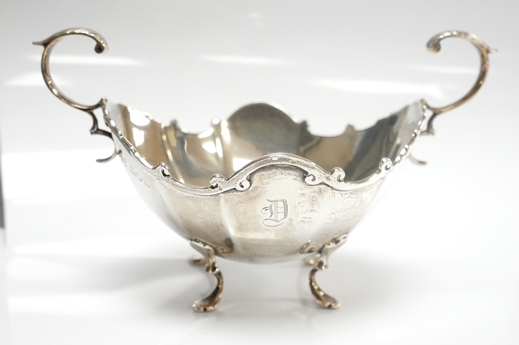 A late Victorian silver three piece bachelor’s tea set, David & George Edward, London, 1899, gross weight 18.8oz. Condition - fair to good